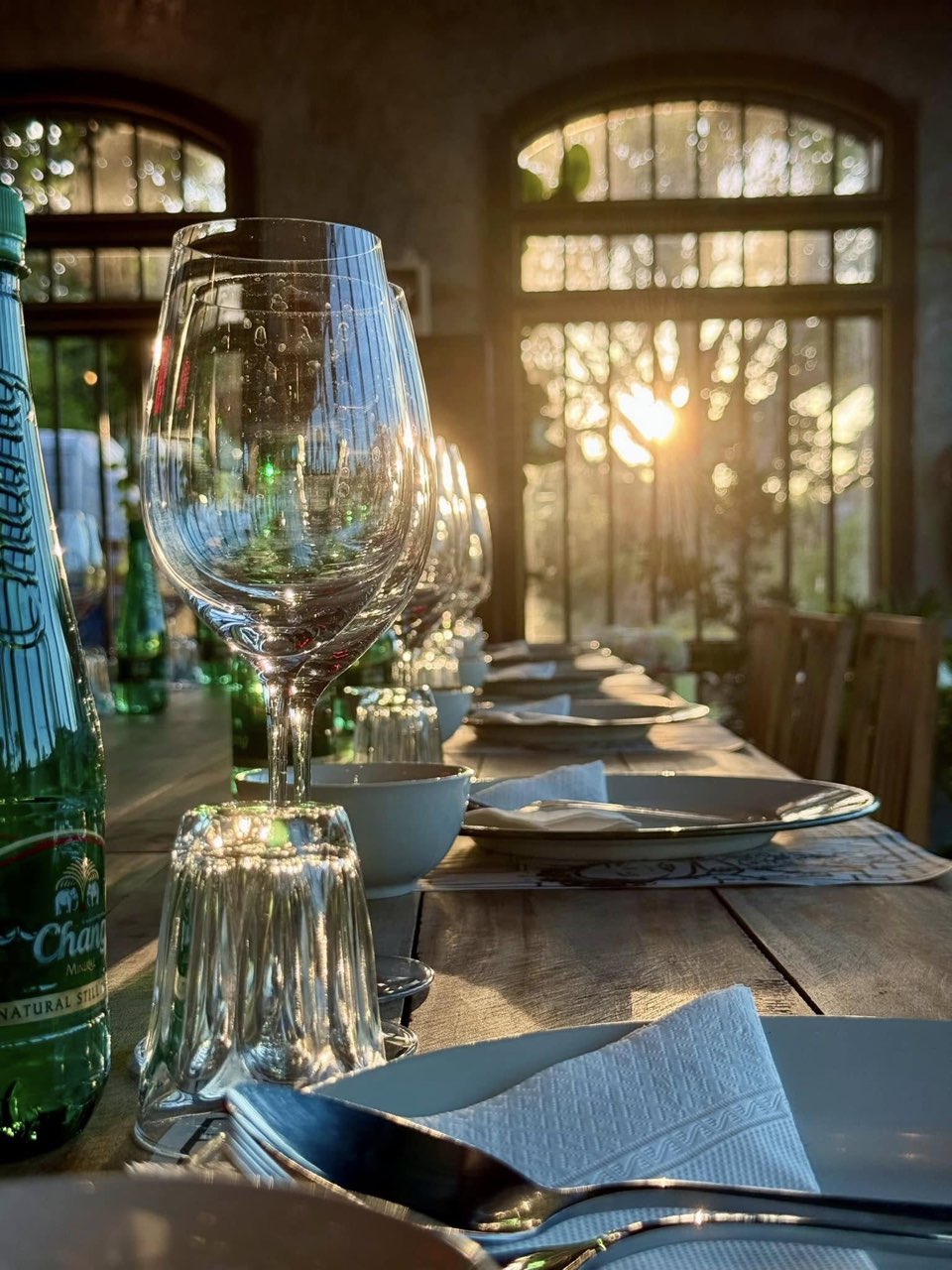Private dinner in the Wo-Ai-Ni glass house at golden hour